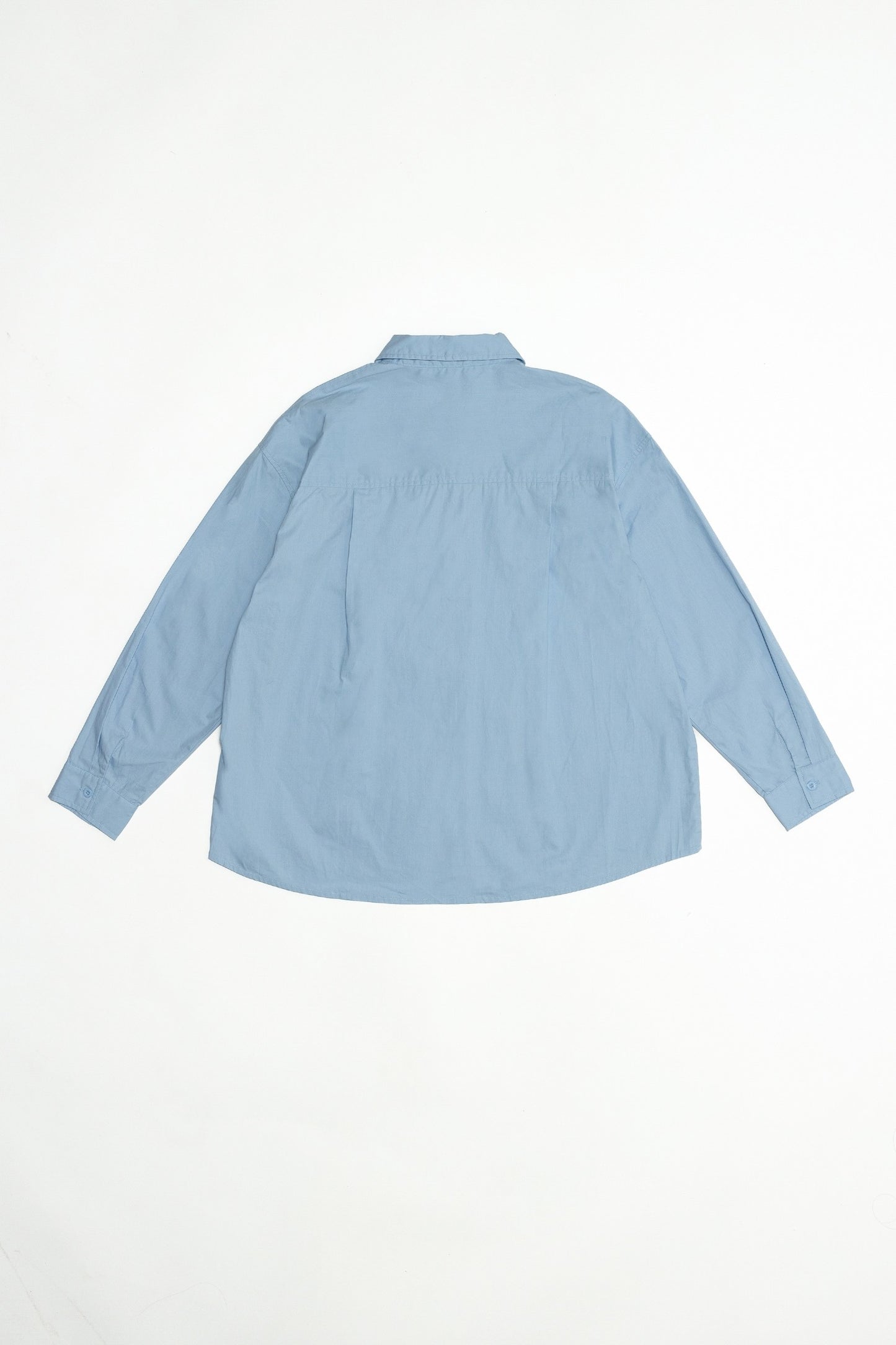 back of the blue button down shirt.