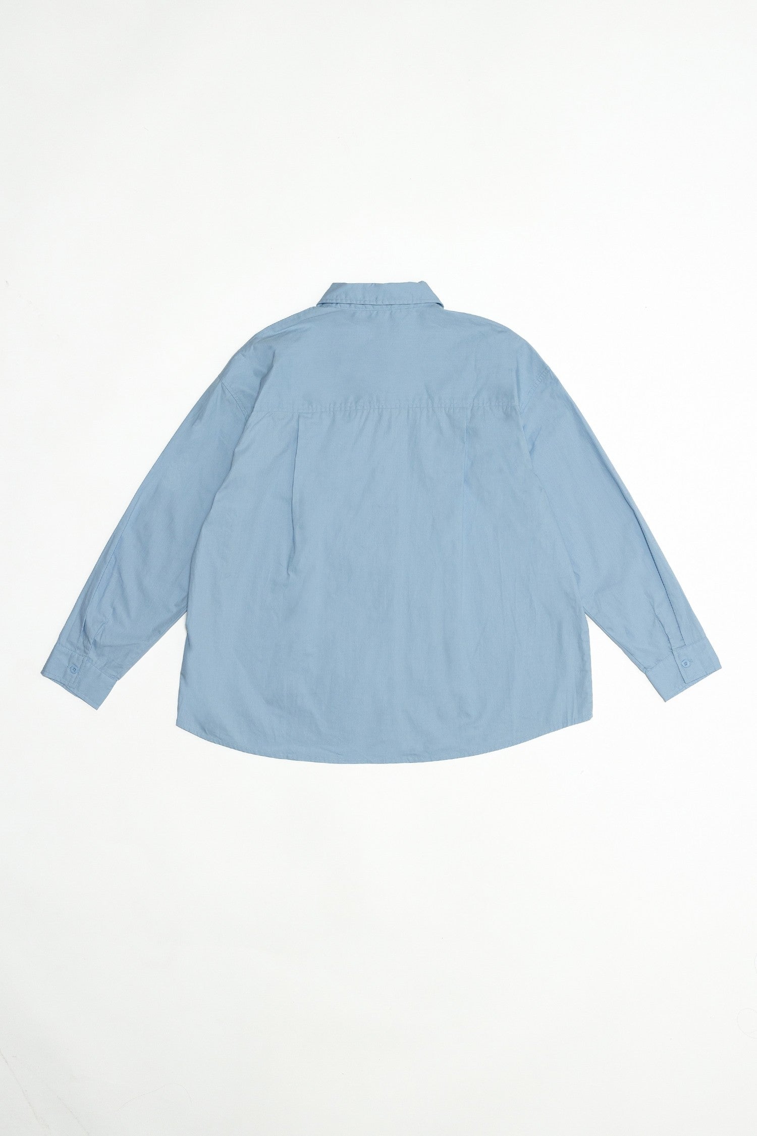 back of the blue button down shirt.
