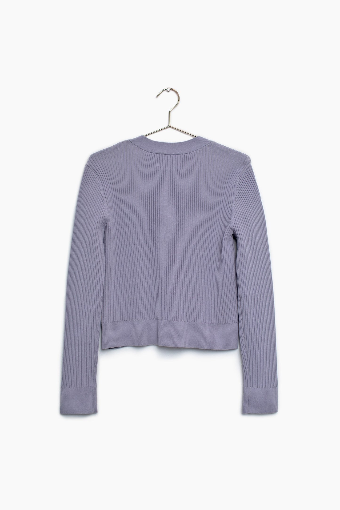 The back of the lilac button up cardigan sweater