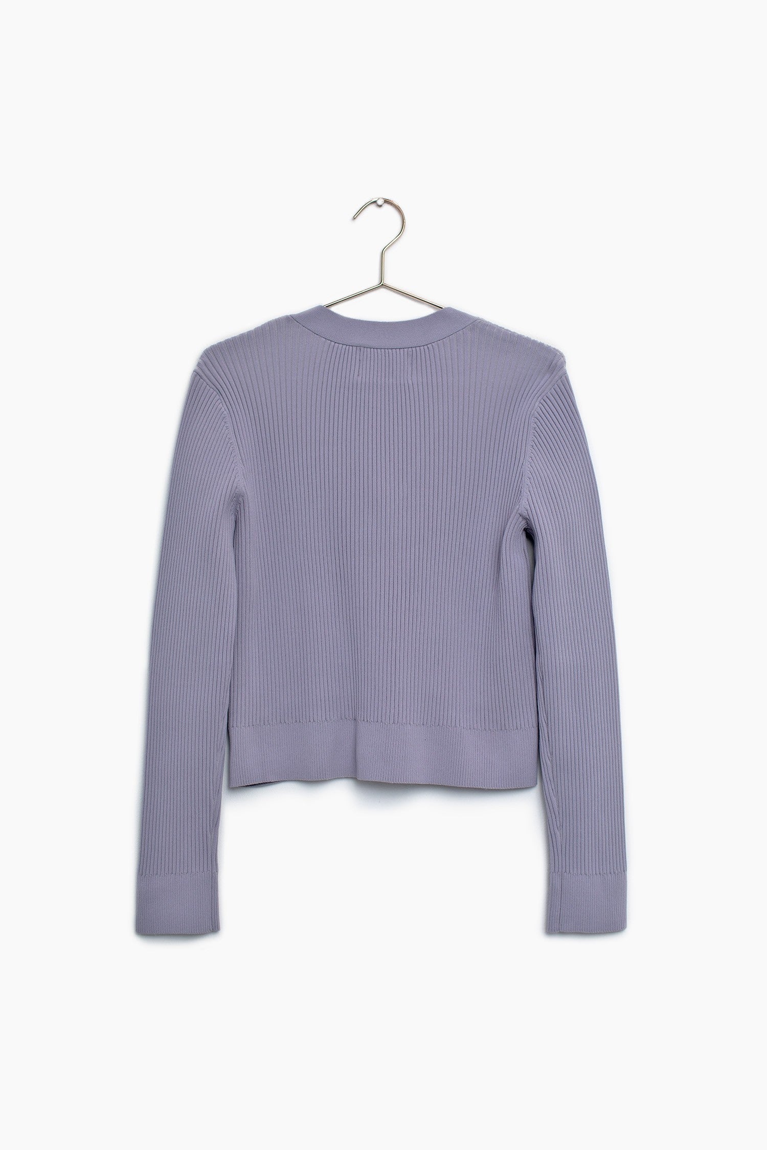 The back of the lilac button up cardigan sweater