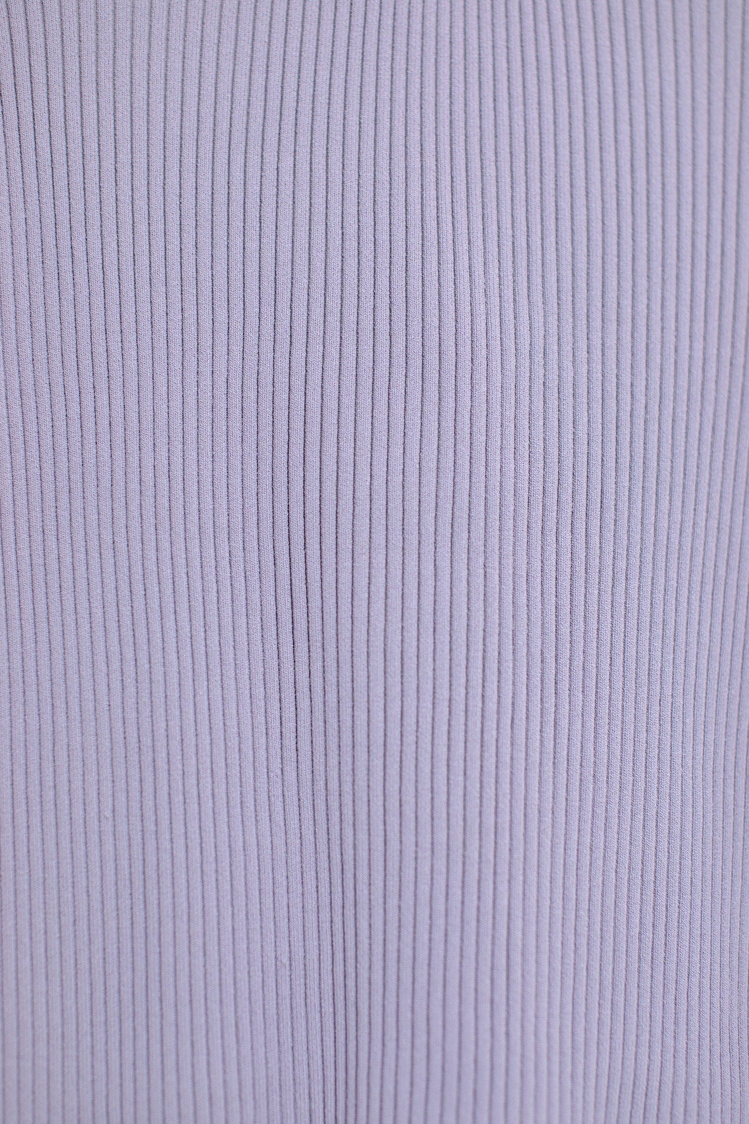 Close up of the Lilac button up cardigan sweater and the knit fabric.