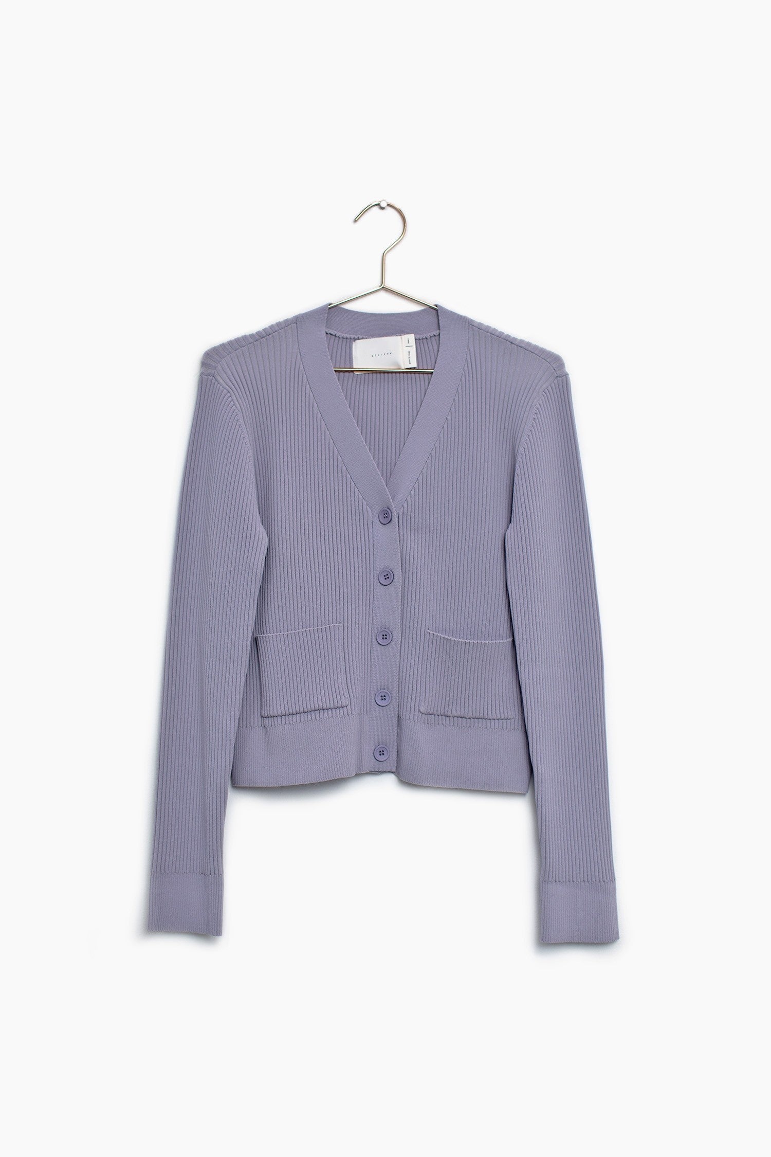 Lilac button up cardigan sweater on a hanger showing how it looks and all the detailing.