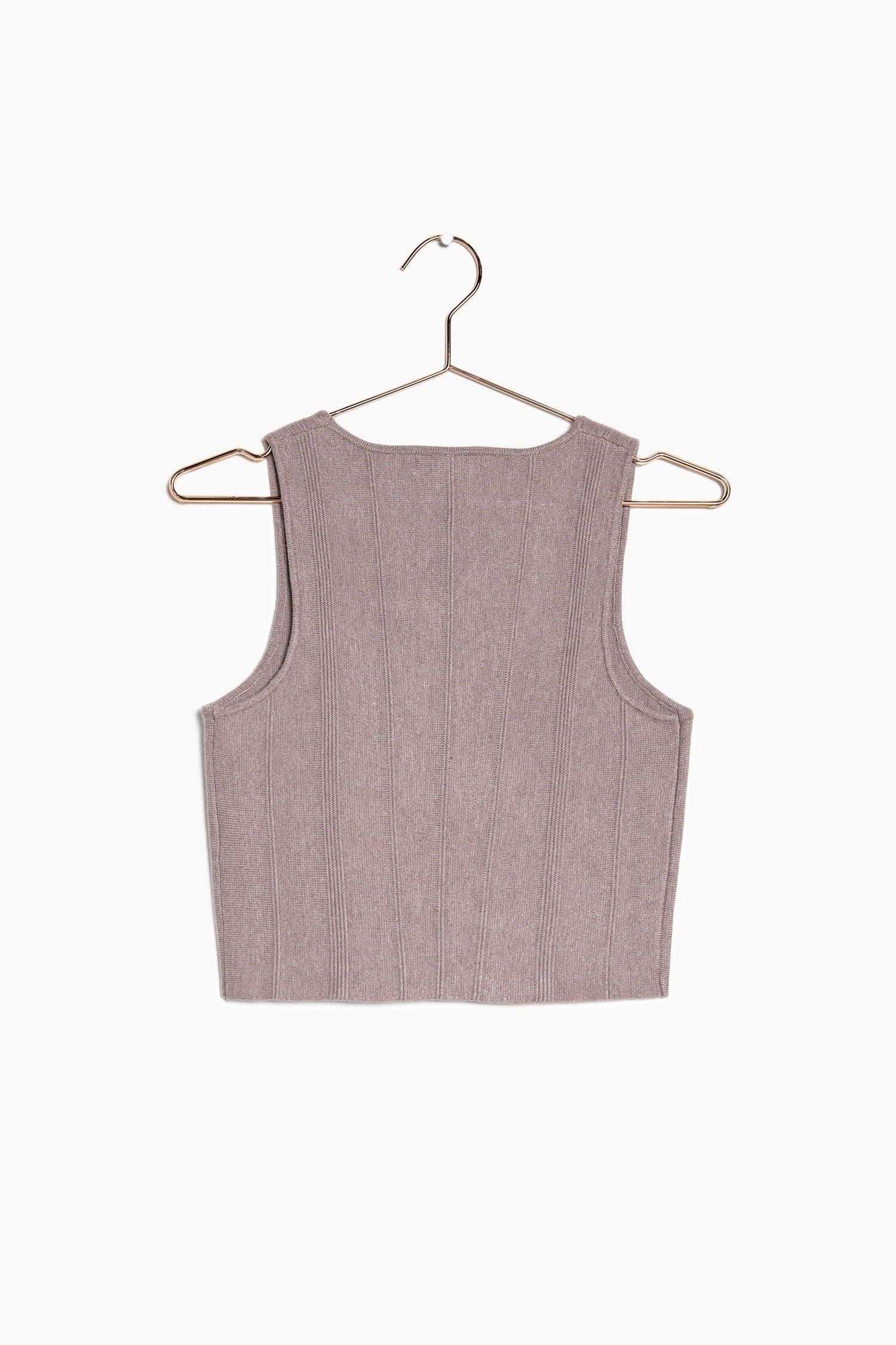 The back of the brown knit crop top and the detail on the top.