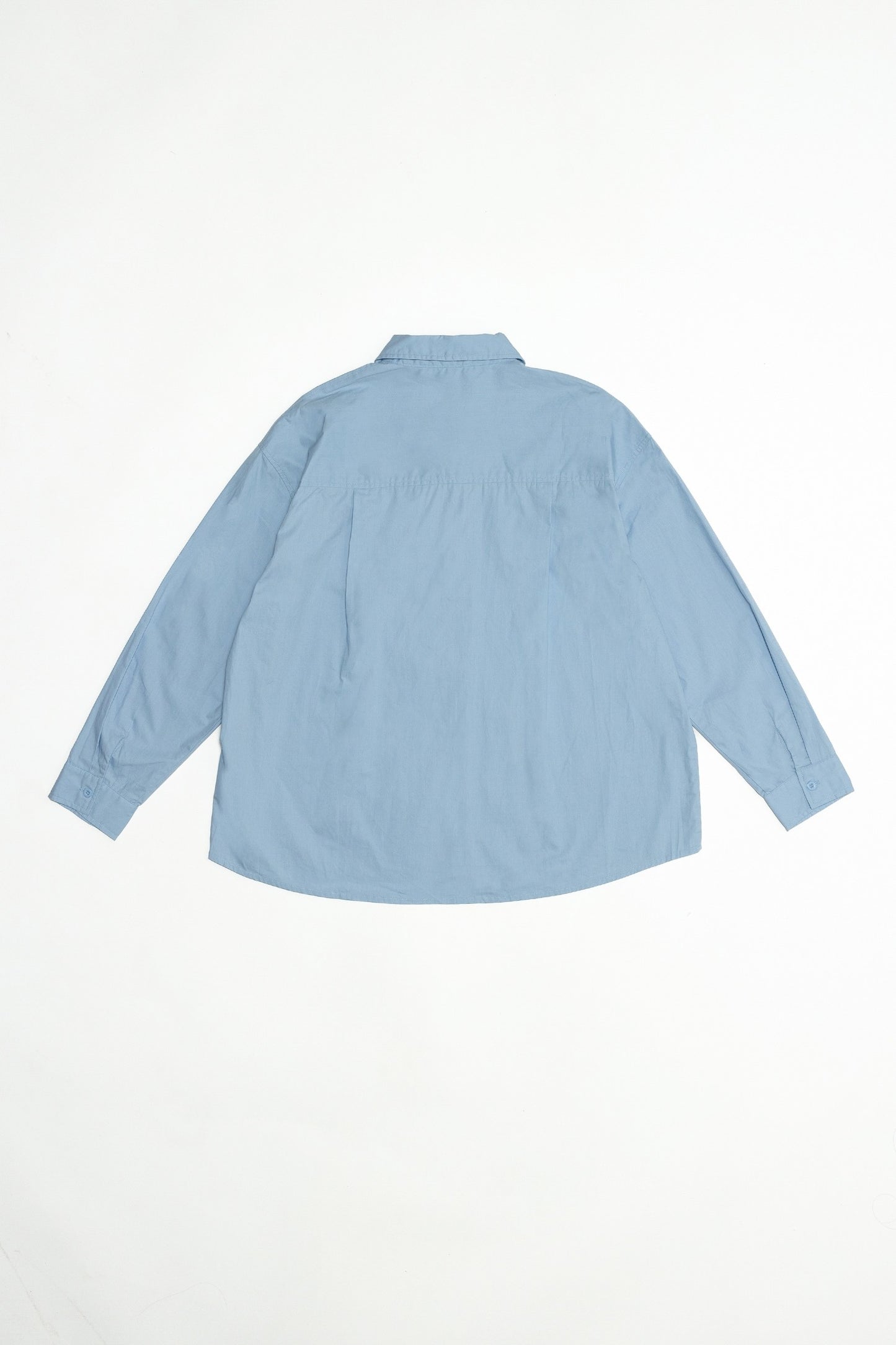 back of the blue button down shirt. 